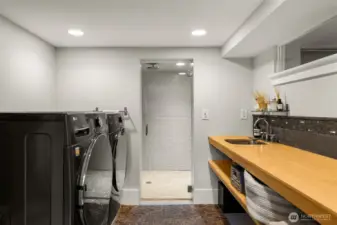 Thoughtfully finished laundry room with detailed shelving and backsplash - New (1 year old) LG appliances