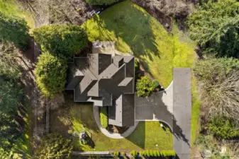 Surrounded by mature landscaping with direct access to the Soos Creek Trail.