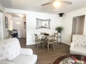 Dining area and living room - showcasing the open concept and natural light.