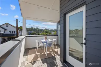 Balcony offering a peaceful outdoor retreat with neighborhood views.