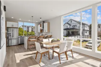 A seamless blend of style and functionality awaits in this open living and kitchen area, designed for modern living.