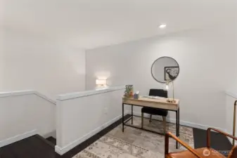Loft area at the top of the stairs. Overlooks the living room.