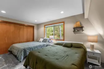 Large bedroom third bedroom with a lot of closet space.