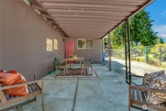 You could convert garage to living space and use this area for main back entertaining space...Stack washer and dryer stay!