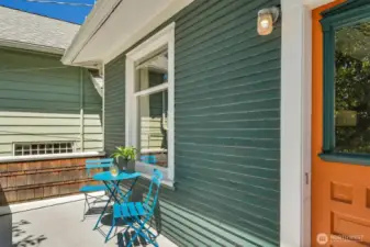 Large, sun-filled front porch.