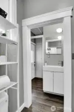 Continental full bath with lots of storage.