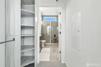 Primary walk-in closet with ensuite bathroom