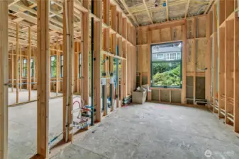Another view of the laundry room, showing dryer venting out the side to allow for flush install of the unit along the back wall. Home as of 10/23