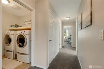 2nd floor walk-in utility room, hallway to 3 additional bedrooms and hall bathroom. This layout is great, the owners suite is on the other end of the hallway