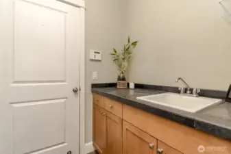 mudroom off the garage and separate from the laundry room