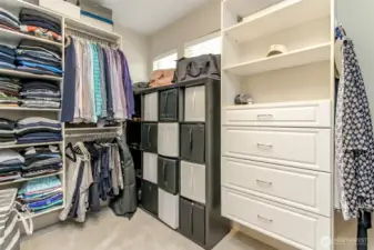 This closet is huge with custom built ins