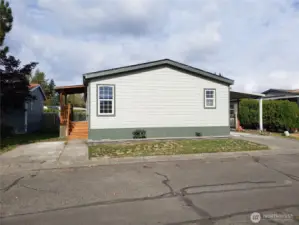 Front View of the Home with New Siding, Trim and Complete Exterior Paint.