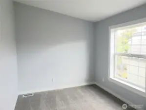 Picture of the Den, Media Room or Extra Living Room with New Paint, Trim and Carpeting.