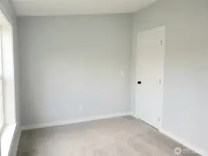 Another Picture of the Den, Media Room or Extra Living Room with New Paint, Trim and Carpeting.