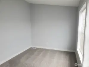 Picture of the Den, Media Room or Extra Living Room with New Paint, Trim and Carpeting.