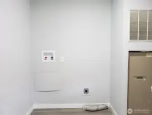 Nice Utility Room with Washer and Dryer Hook Ups.