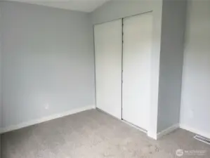 Another Picture of the Spacious Fourth Bedroom with New Paint, Trim and Carpeting Showing Large Closet.