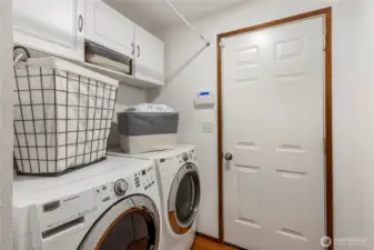 Laundry room with access to garage