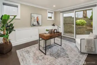 First-floor office/den with private door for outdoor access.