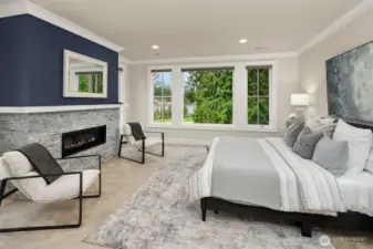 The primary suite offers a spacious and comfortable retreat, designed to provide both luxury and relaxation. One of its standout features is the spectacular view of Lake Washington.