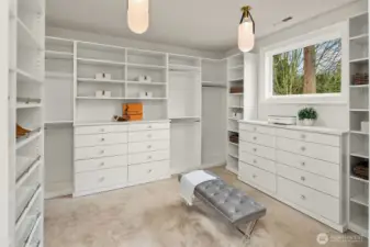 This walk-in closet is the perfect space for that fashion forward individual. Designed with style and functionality in mind, this closet provides an organized environment where every piece has its place.