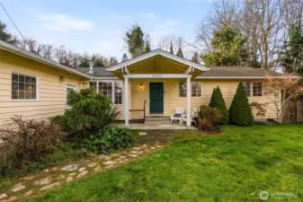 Single-level 3-bedroom home with detached two-car garage on a .28-acre lot in Hansville, Washington, offering a quiet setting.