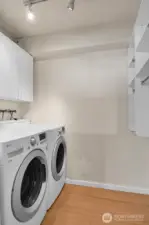 Light and bright laundry area.