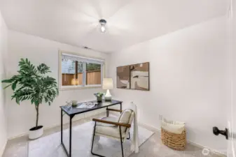 Convenient office or guest room on main floor with access to full bathroom.