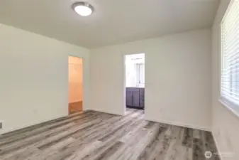 Primary suite features a walk in closet and en-suite bathroom.