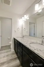 Primary bath also has a separate water closet.