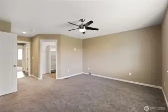 Primary Suite with Ceiling fan & walk in closet