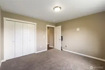Secondary Bedroom #1 - view front inside toward closet & entry