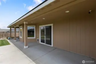 Covered back patio area is great for grilling or relaxing