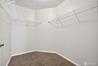 Spacious walk-in closet in first secondary bedroom with abundant storage