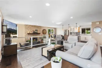 Gourmet kitchen flows seamlessly into expansive living and dining areas...