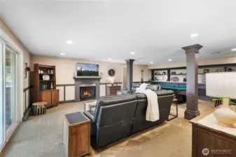 Downstairs, the daylight basement offers a second full living room!