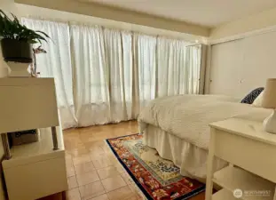 Primary bedroom with full bath is a soothing, serene retreat.