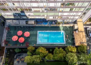 Building amenities include outdoor pool and lounge area, secure deeded parking, car wash station and EV charging.