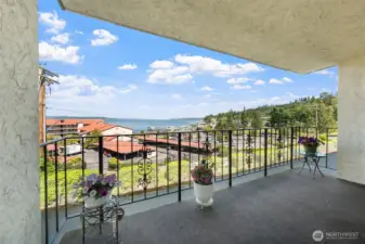 Private balcony with views and a storage unit.