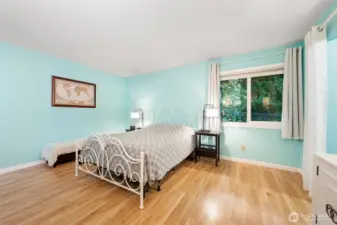 Spacious primary bedroom with walk in closet and ensuite bath.