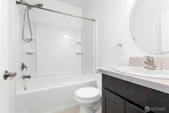 Main level full bathroom.