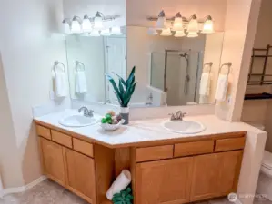 Double sinks in the master bathroom.