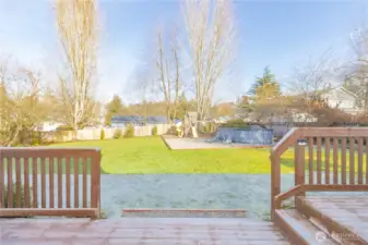 Fully fenced back yard for everyone, furry friends and toys galore.