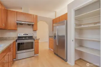 Access to dining room and large pantry on right.