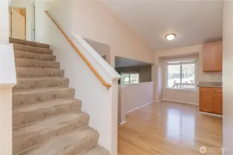 Stairs to bedrooms upstairs and two full bathrooms.