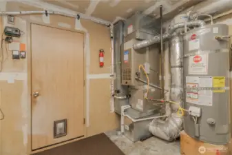 Garage with furnace and water heater. Sprinkler system in garage, seller never used.