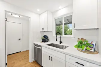 Laundry off kitchen. Pantry space on left