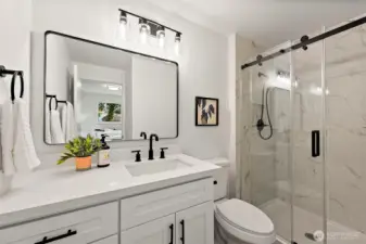 Primary bath - updated fixtures and tiled shower