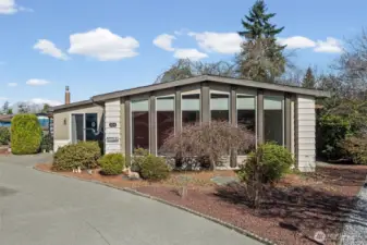 Lot's of windows with an easy care yard.