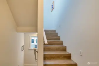 From Double Garage Access - Stairs up to 3rd Level Suite and down to Main Floor